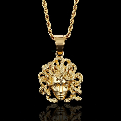 Gold Medusa pendant with gorgon head and serpent details