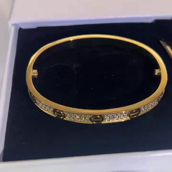iced out gold bangle bracelet with diamond setting