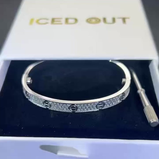 iced out white gold bangle bracelet with diamond setting